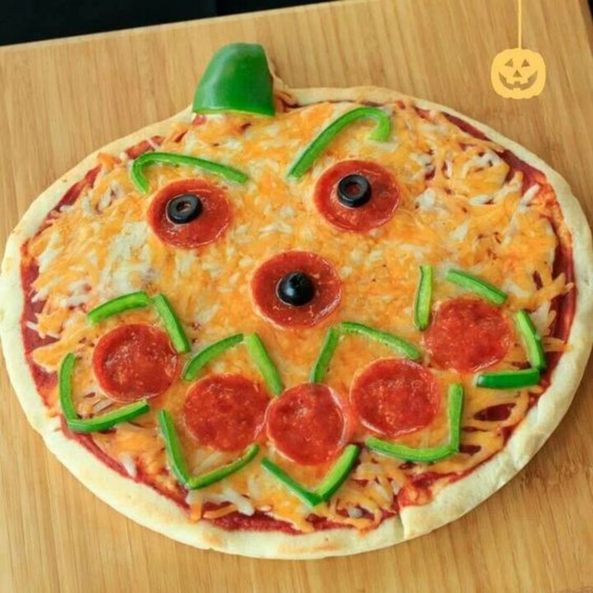 Jack o lantern pizza