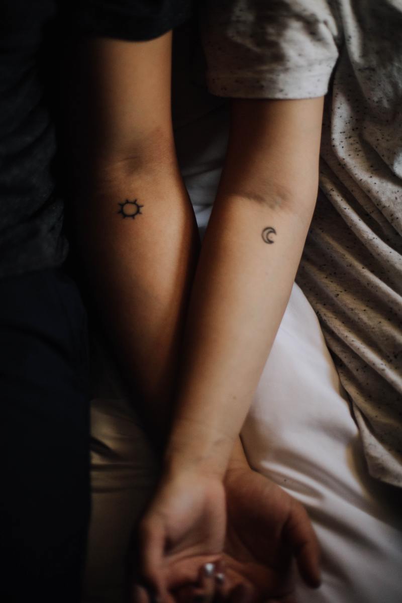 Matching tiny tattoos for loved ones. 