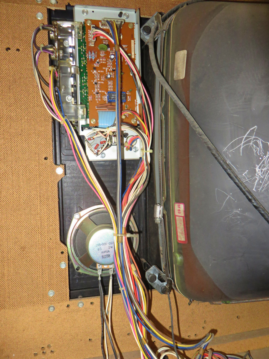 The Inside of the Control Panel of the Curtis Color Console Model H2508ME. Note all the wires and circuit boards that controled the colors and sound. 