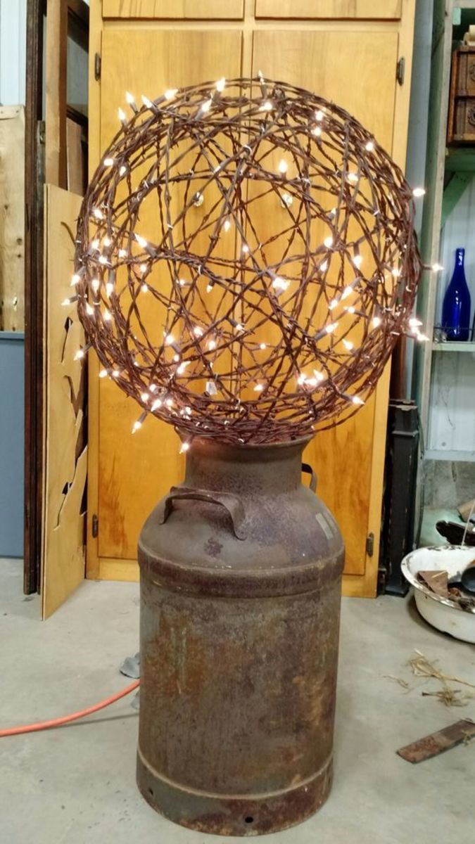 Lighted barbed wire ball