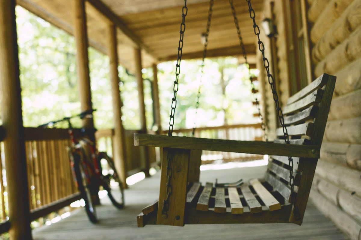 A porch swing promotes relaxation and helps make your porch a welcome gathering place.