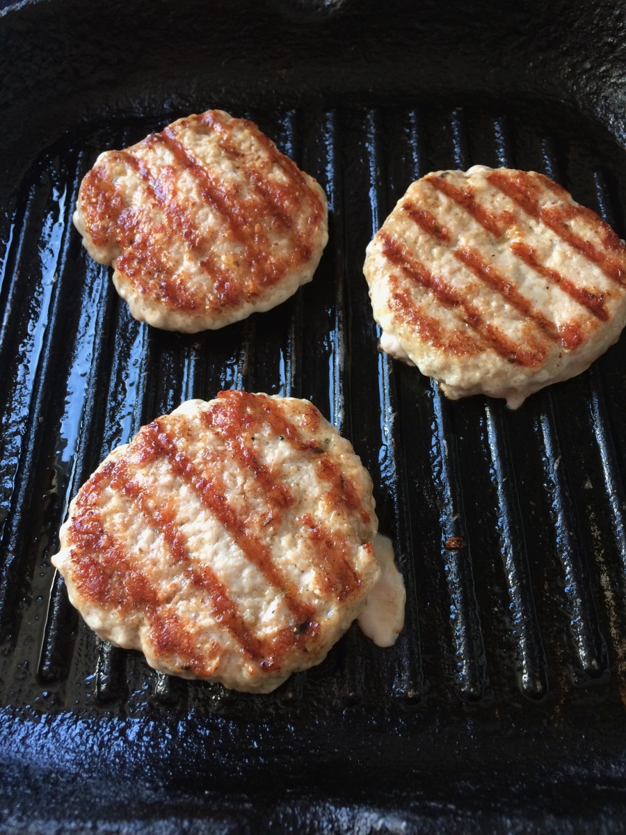 Pork sausage burgers on a grill pan
