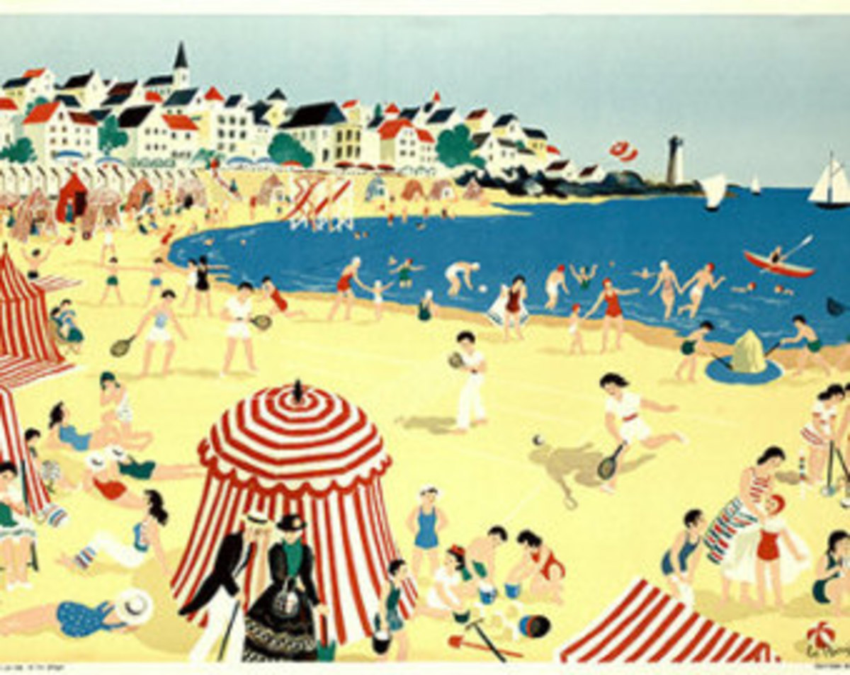 Fun Beach seen with yellow/white sand, blue water and cabanas in white and red stripes with beach goers in the foreground and houses on the hillside