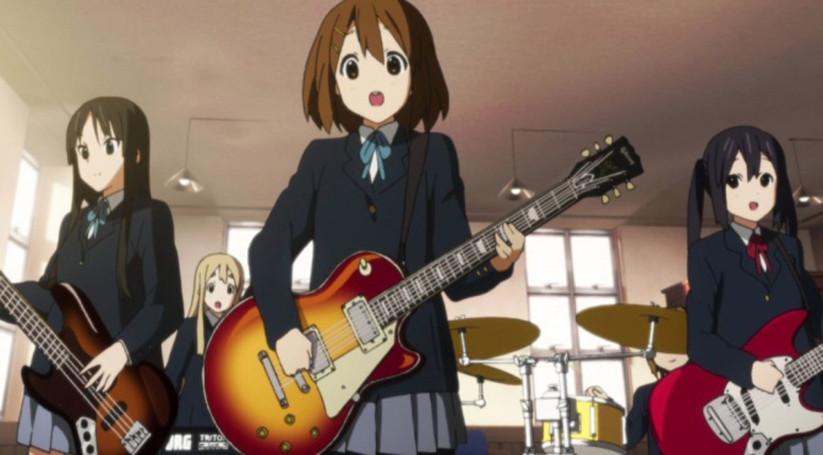 Yui playing her guitar.