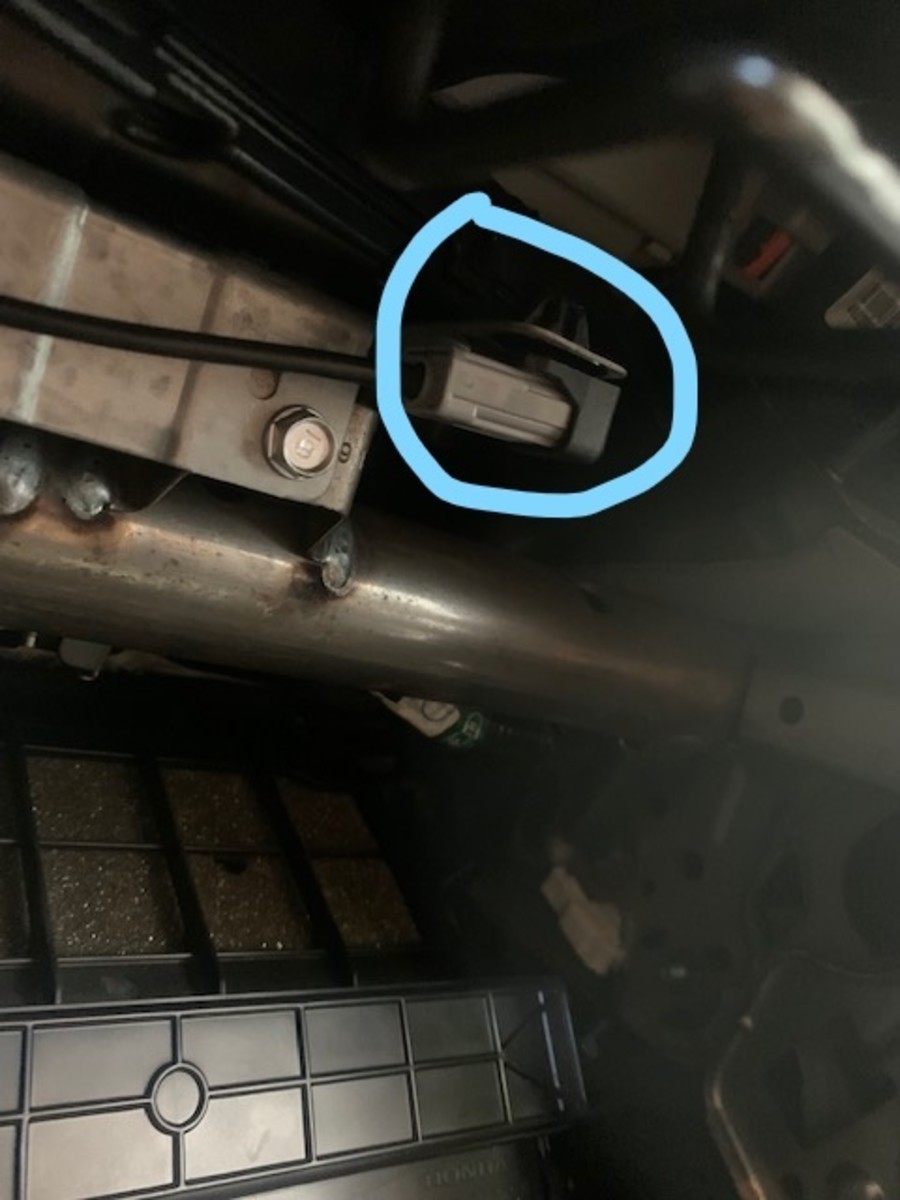 Look up under the dash. The USB may be in its fixed position or not, just pull it.