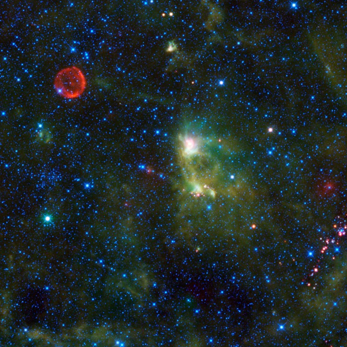 The red circle visible in the upper left part of this infrared image is the remnant of Tycho’s supernova of 1572.