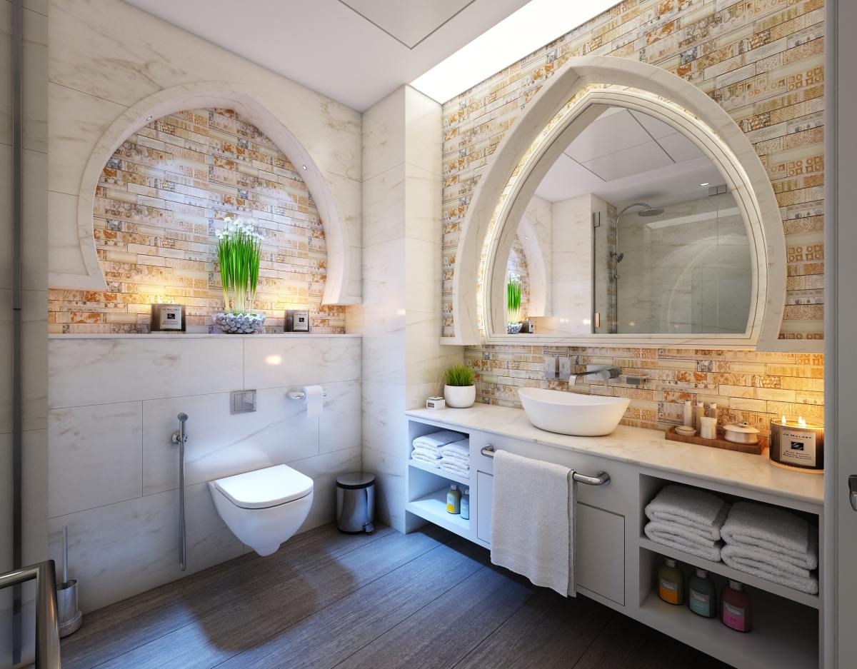 I love the rounded molding in this bathroom. I feel like it would go very well for someone trying to replicate a Cancer vibe. Everything is nicely organized, and there are playful contrasts with the wall designs and bricks.