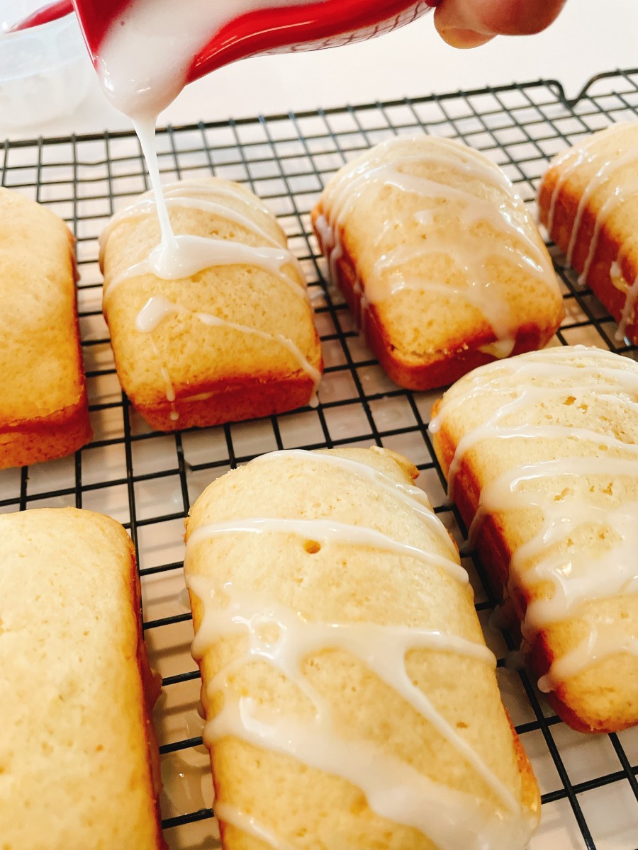 Pour the lemon glaze on top of each loaf and let them set. 