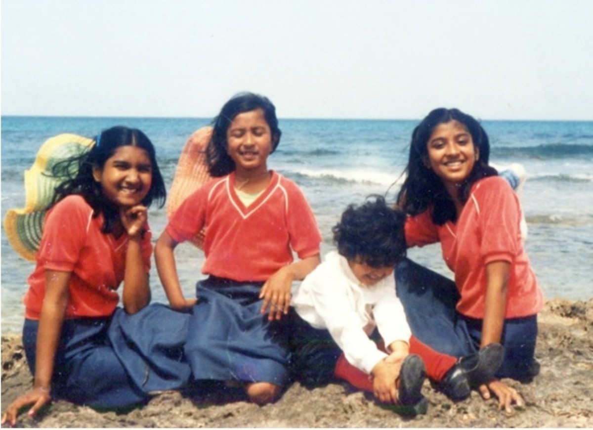 Pic19: My Sisters and I Sitting Near the Sea Along with a Family Friend’s Little Daughter