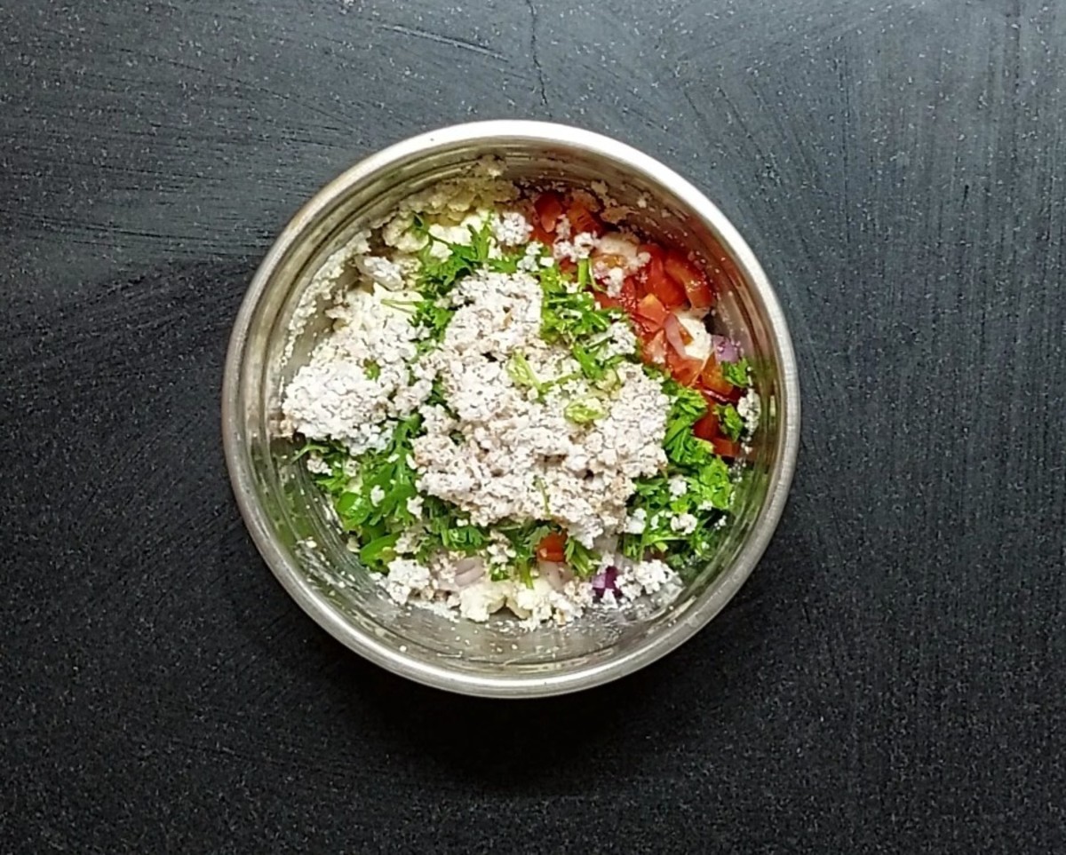 Add 1 chopped onion, 1 chopped tomato, 1-2 green chilies, 1/2 cup coriander leaves and 1/2 cup grated coconut.