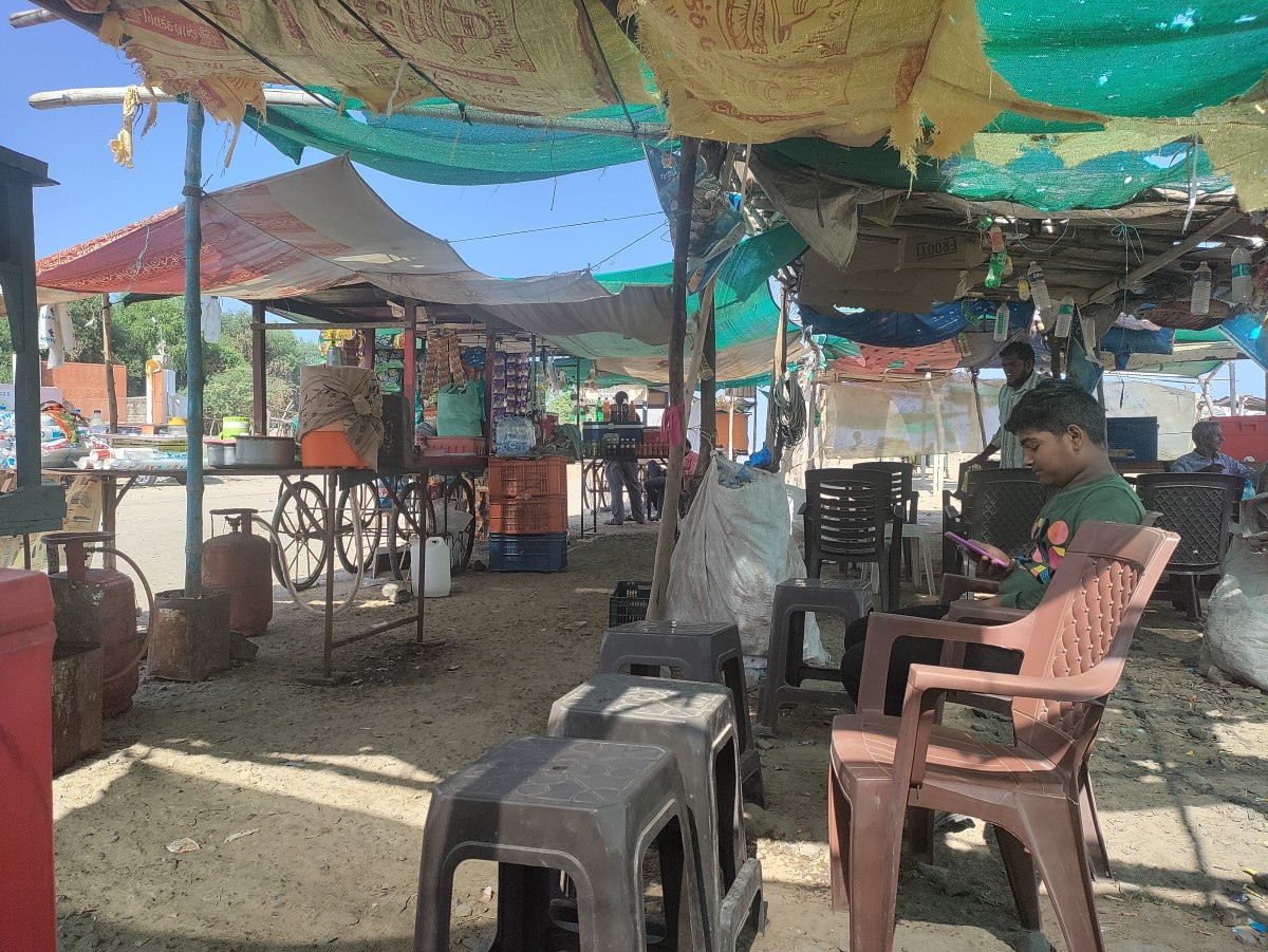 Stalls serving snacks and drinks; Kavi Kamboi