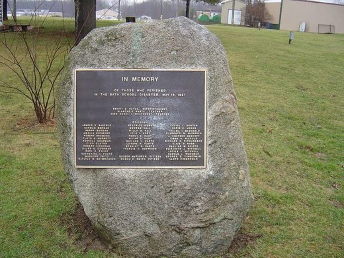 Memorial boulder, listing names of some of the victims