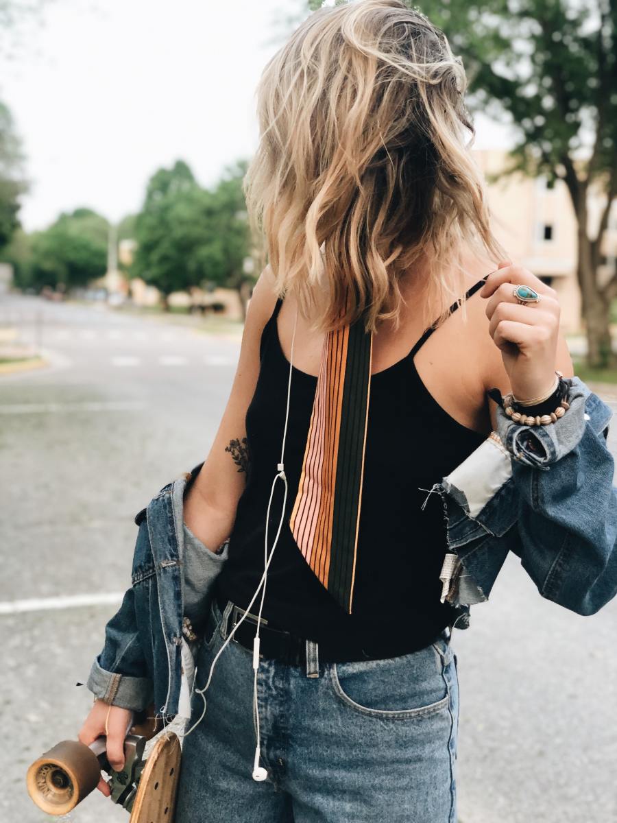 When it comes to accessories, Sagittarius is random. Throw on mismatched jewelry. Put on a scarf or tie. Wear an oversized denim jacket.