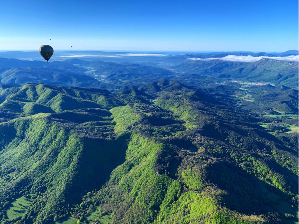 Take a hot air balloon ride in the mountains of Catalonia. 