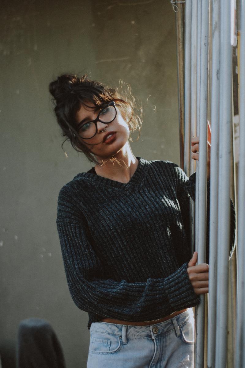 When it comes to a Capricorn look, keep things simple. Put on a dark gray sweater, and you're already pretty much communicating the right vibe.