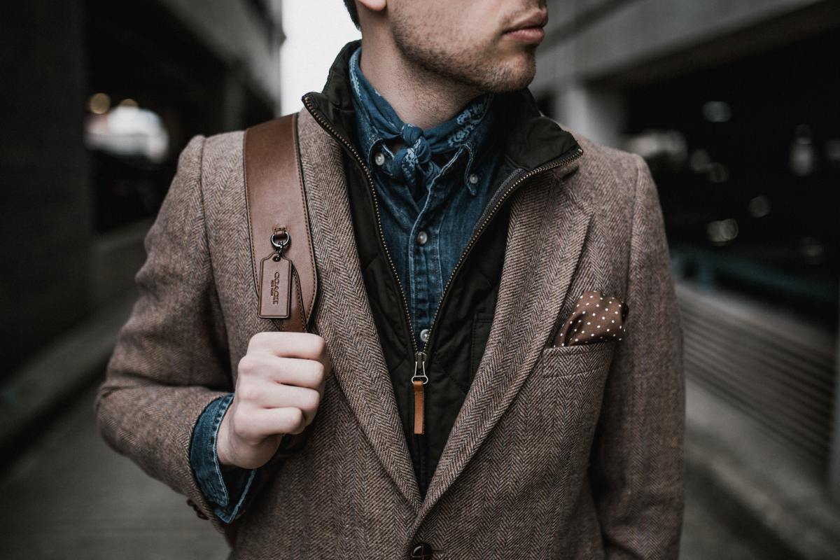 Look at this gorgeous color scheme. The mix of brown and that aged dreamy blue communicate a Capricorn look. The mix of coats and the bag make it clear that someone is prepared. (Though the pocket square might be a little much.)
