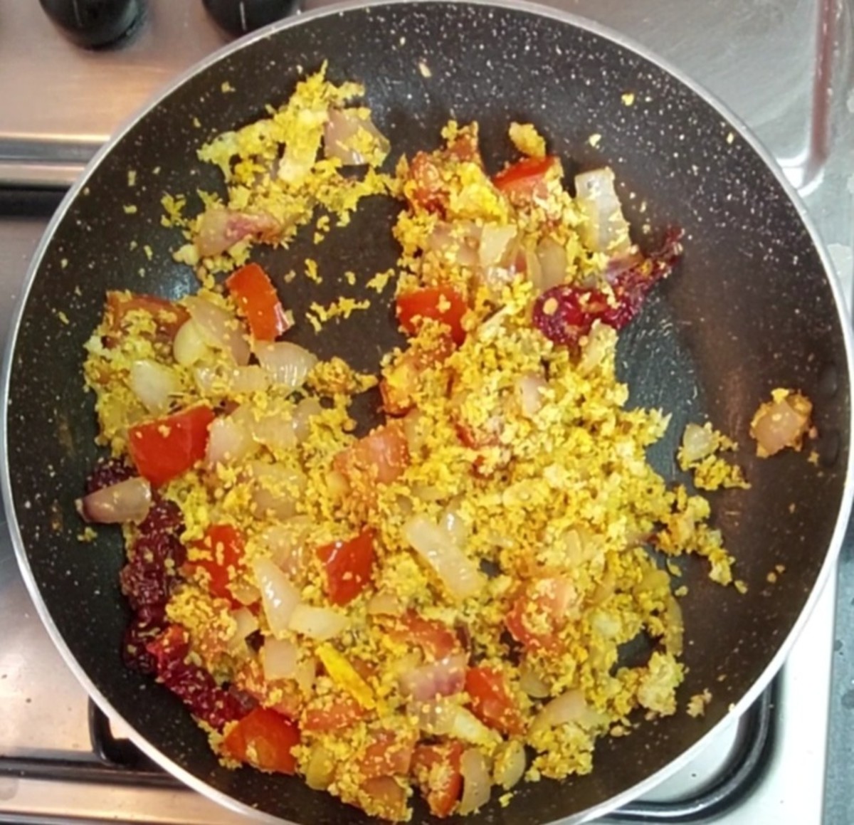 Add 1 cup grated fresh coconut and 1/2 teaspoon turmeric powder. Give a quick mix and switch off the flame.
