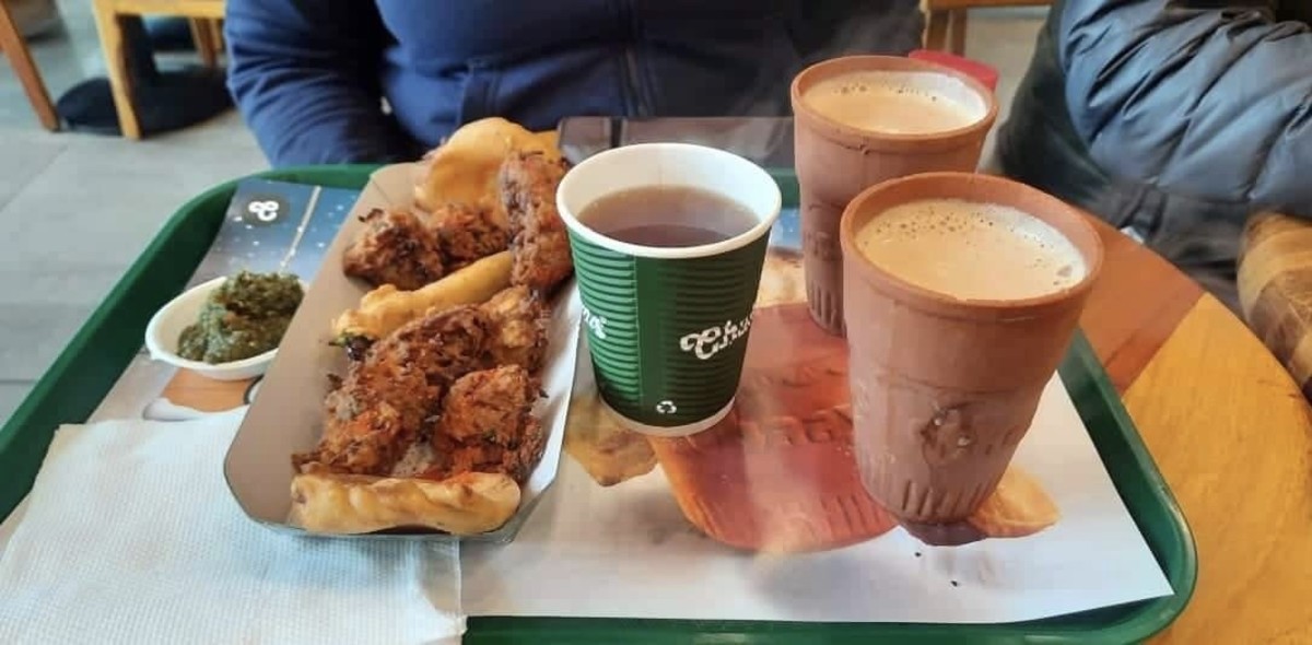Happiness can also be found in a hot cup of spice tea and pakoda on a rainy day 