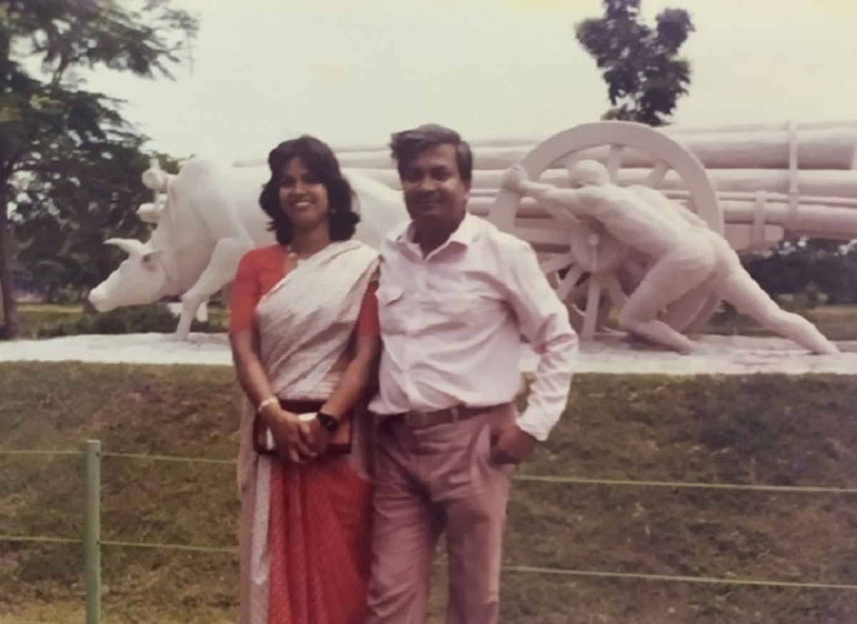 Pic: My Parents Pose in front of a Mesmerizing Statue at Sonargaon