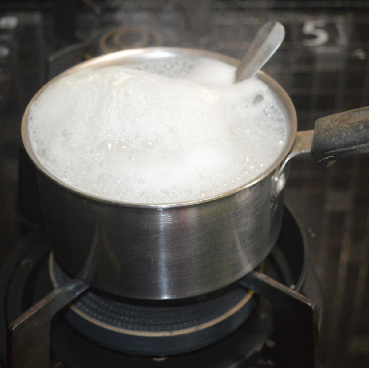 Step two: Add the milk to a saucepan. Boil until it reduces to three-quarters of the original volume.