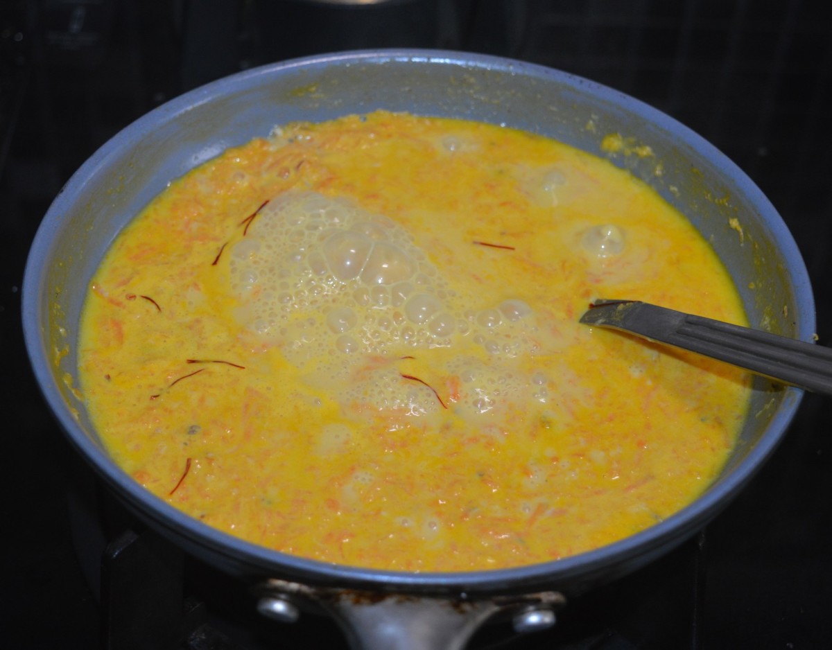 Reduce the heat and simmer until the carrots cook completely. Add optional saffron and continue to cook for a minute.