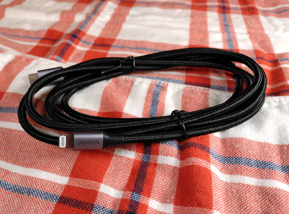 USB-C to Lightning cable used for charging Apple devices.