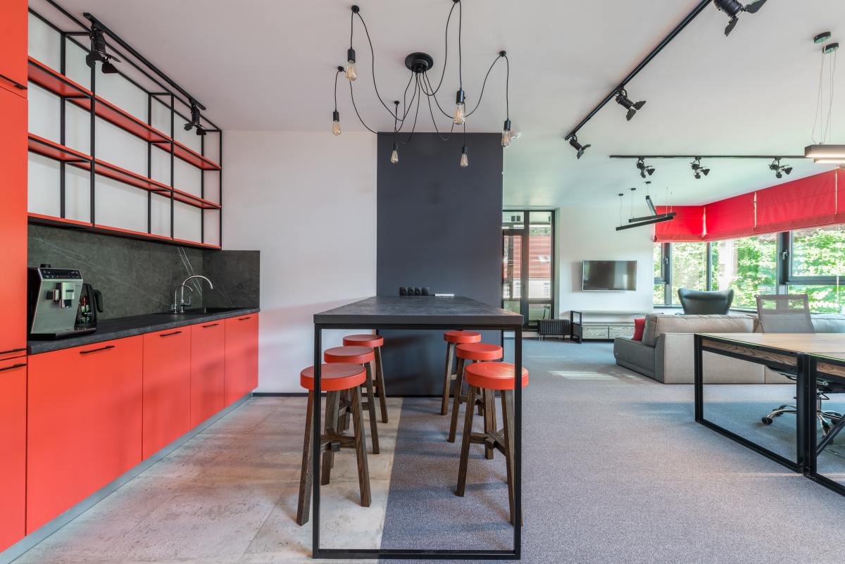 Red cabinets will signal that a kitchen has fire energy to it. It's a good idea to balance out the rest of the room by using neutral colors.