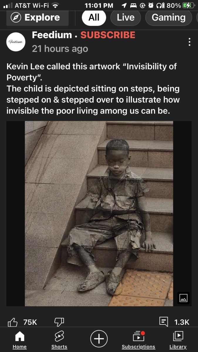 Kevin Lee called this artwork “Invisibility of Poverty”. The child is depicted sitting on steps, being stepped on & stepped over to illustrate how invisible the poor living among us can be.