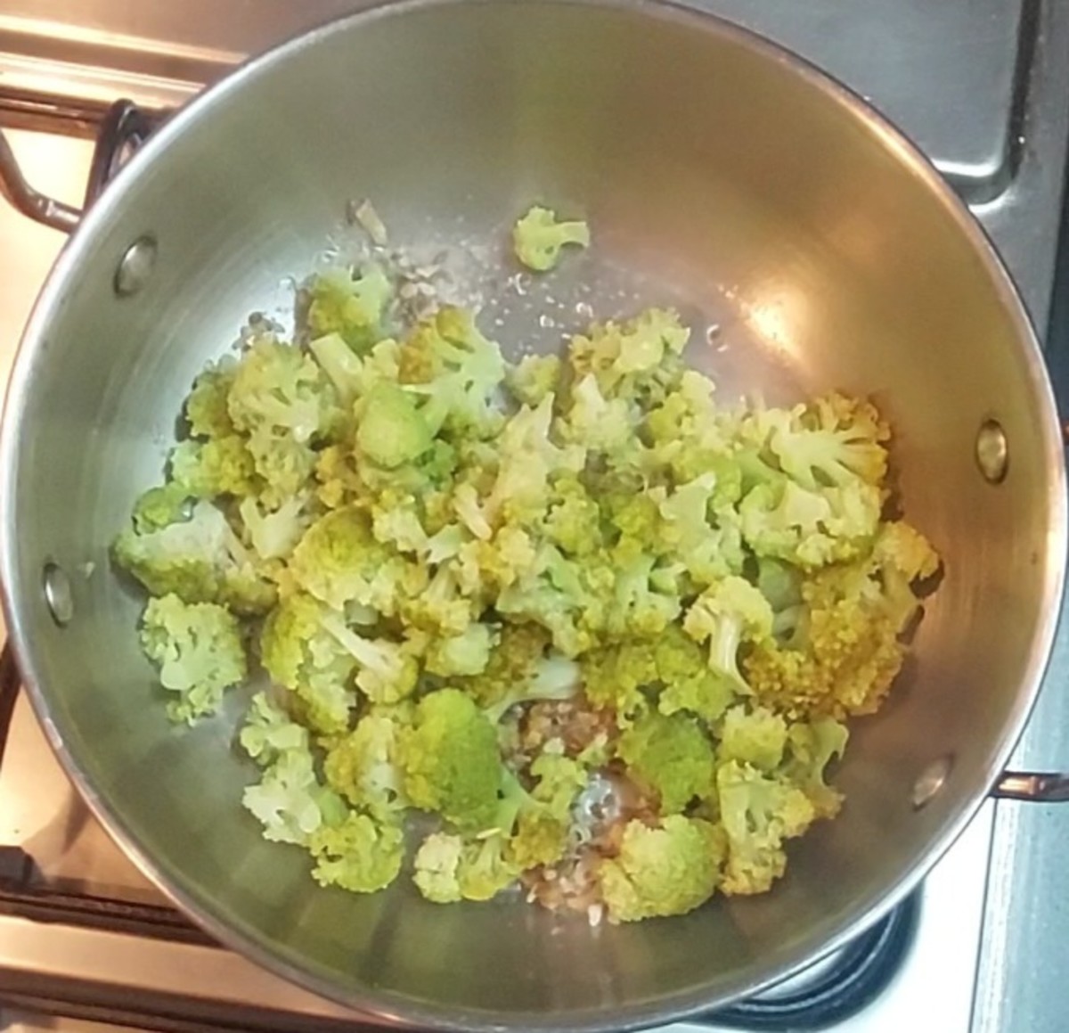 Add broccoli, mix well with the seasoning. Add salt to taste