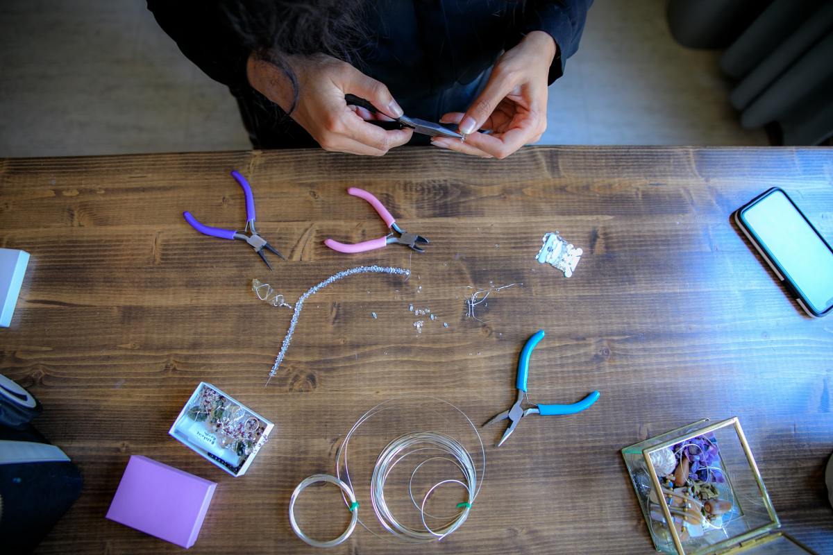 A view of someone making jewelry 