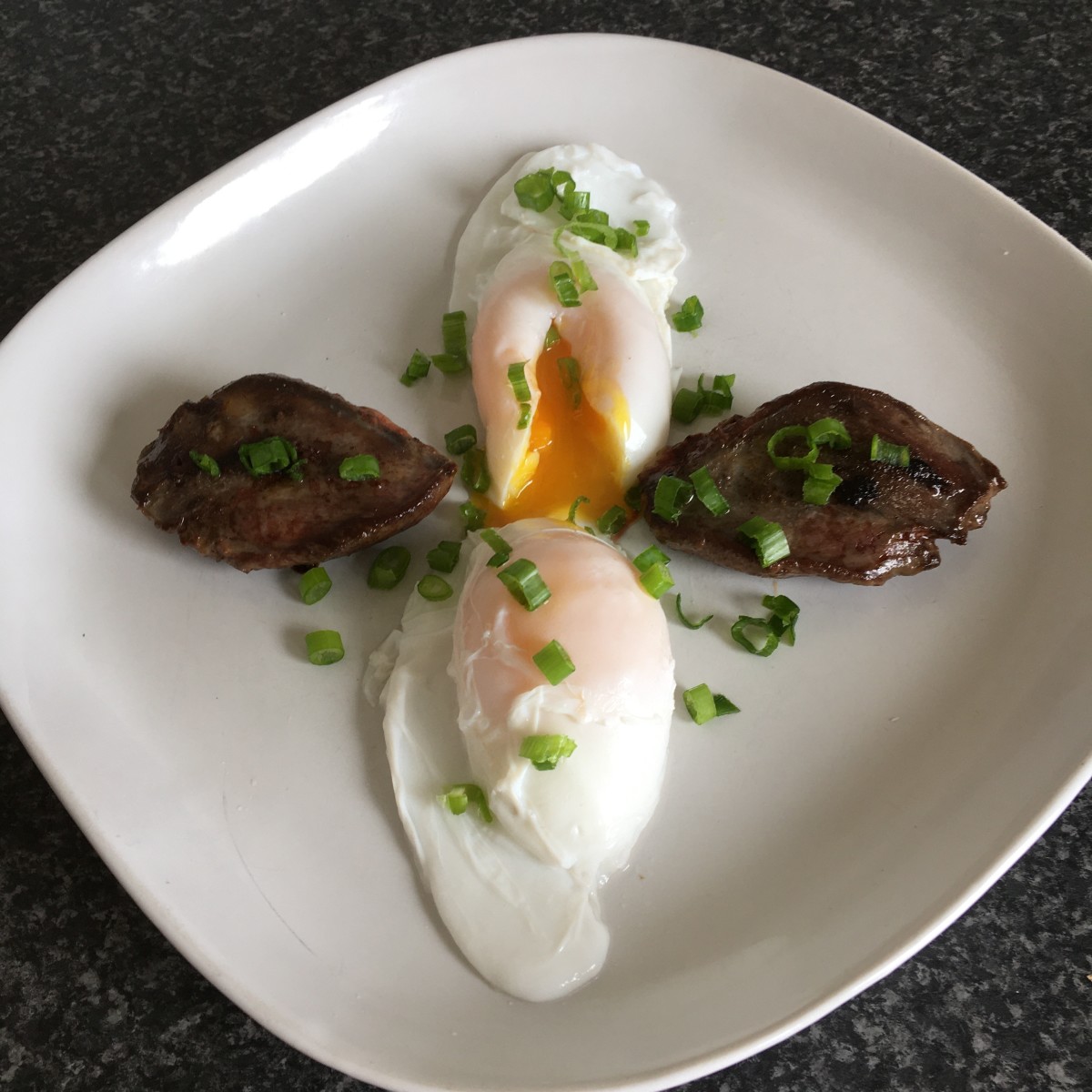 Pigeon breasts are simply served with poached fresh duck eggs