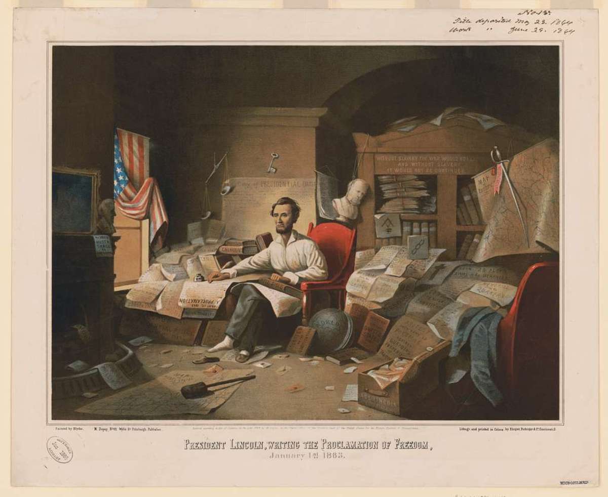 President Lincoln writing the Emancipation Proclamation.