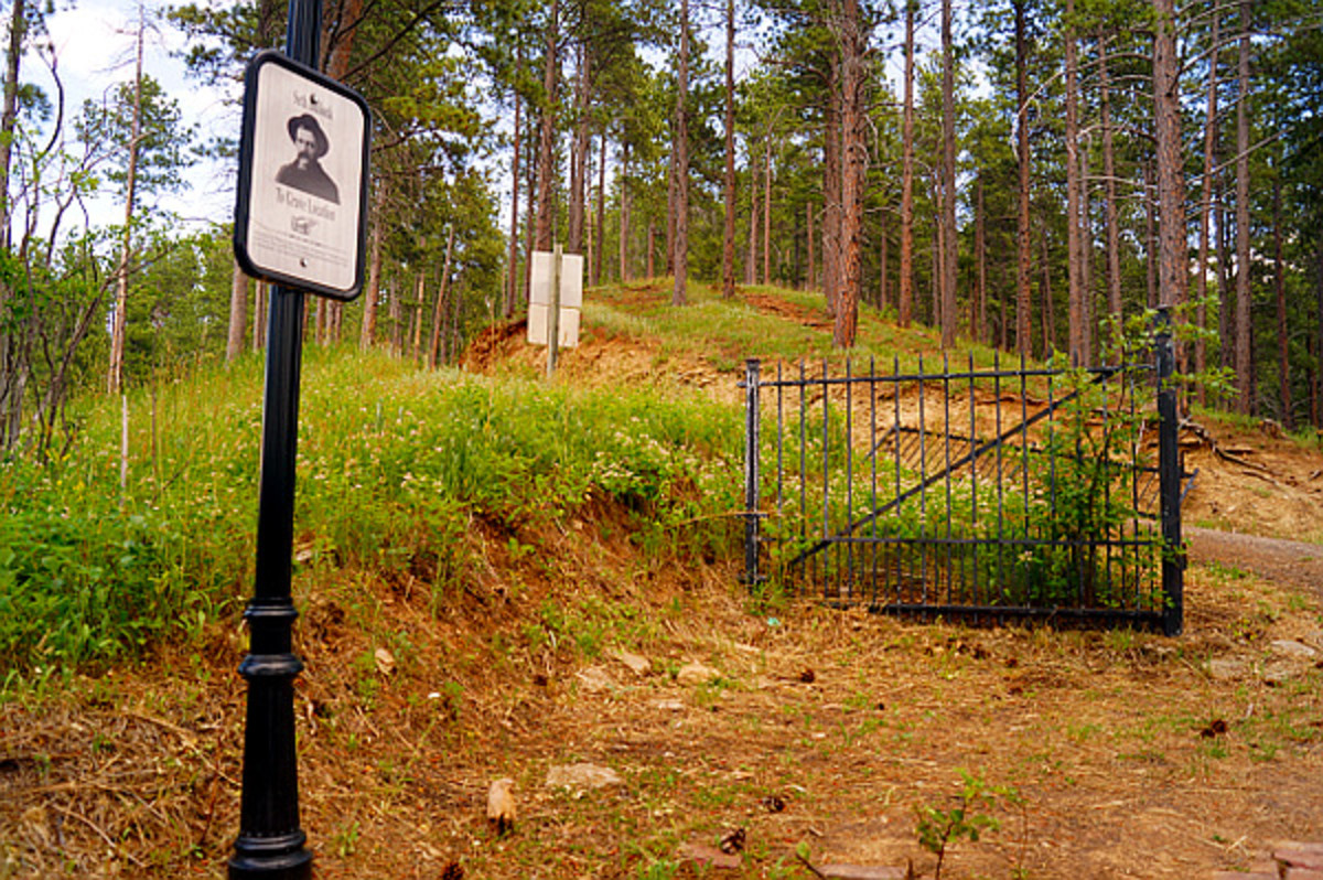 A sign points to the trail that will take you 750 ft above the cemetery to Seth Bullock's gravesite.