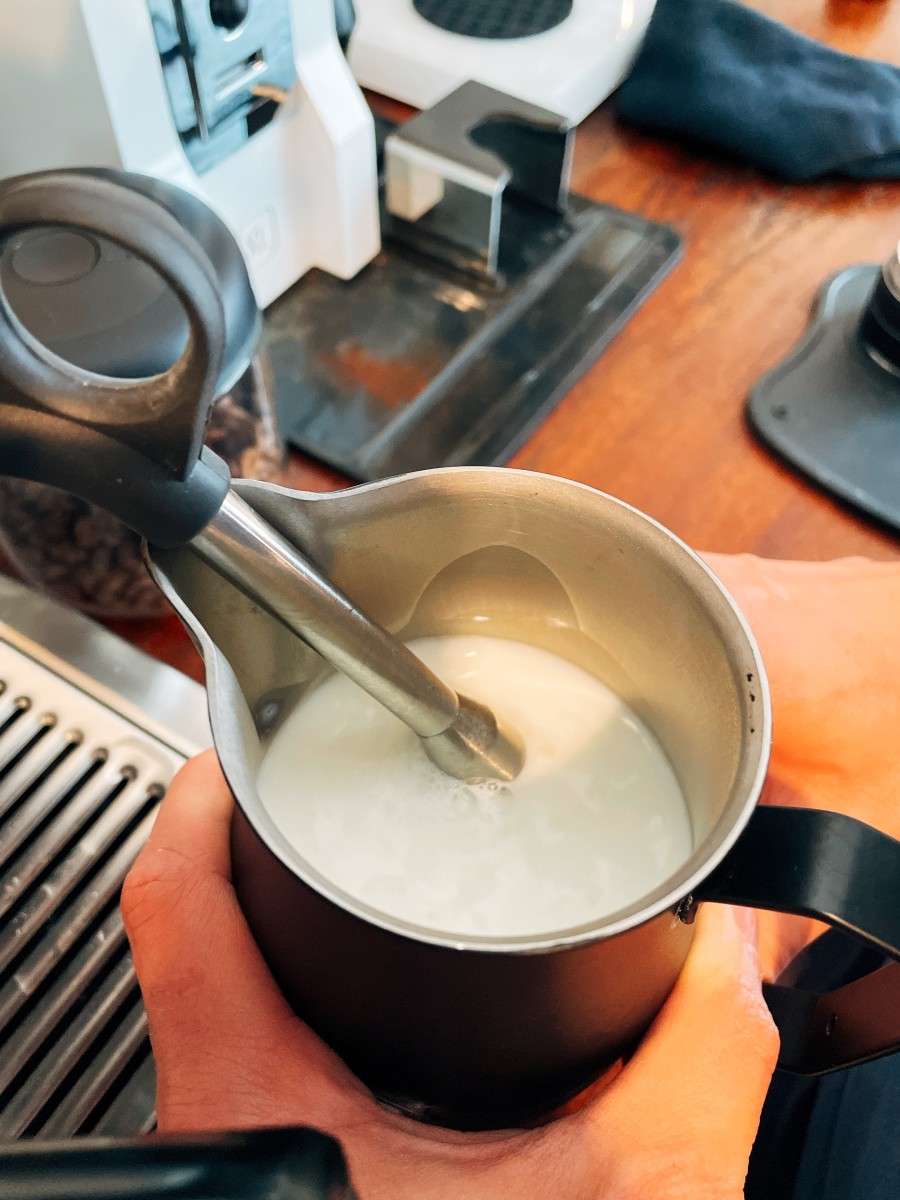 If you own an espresso machine at home, be a barista for the day by making coffee at home.