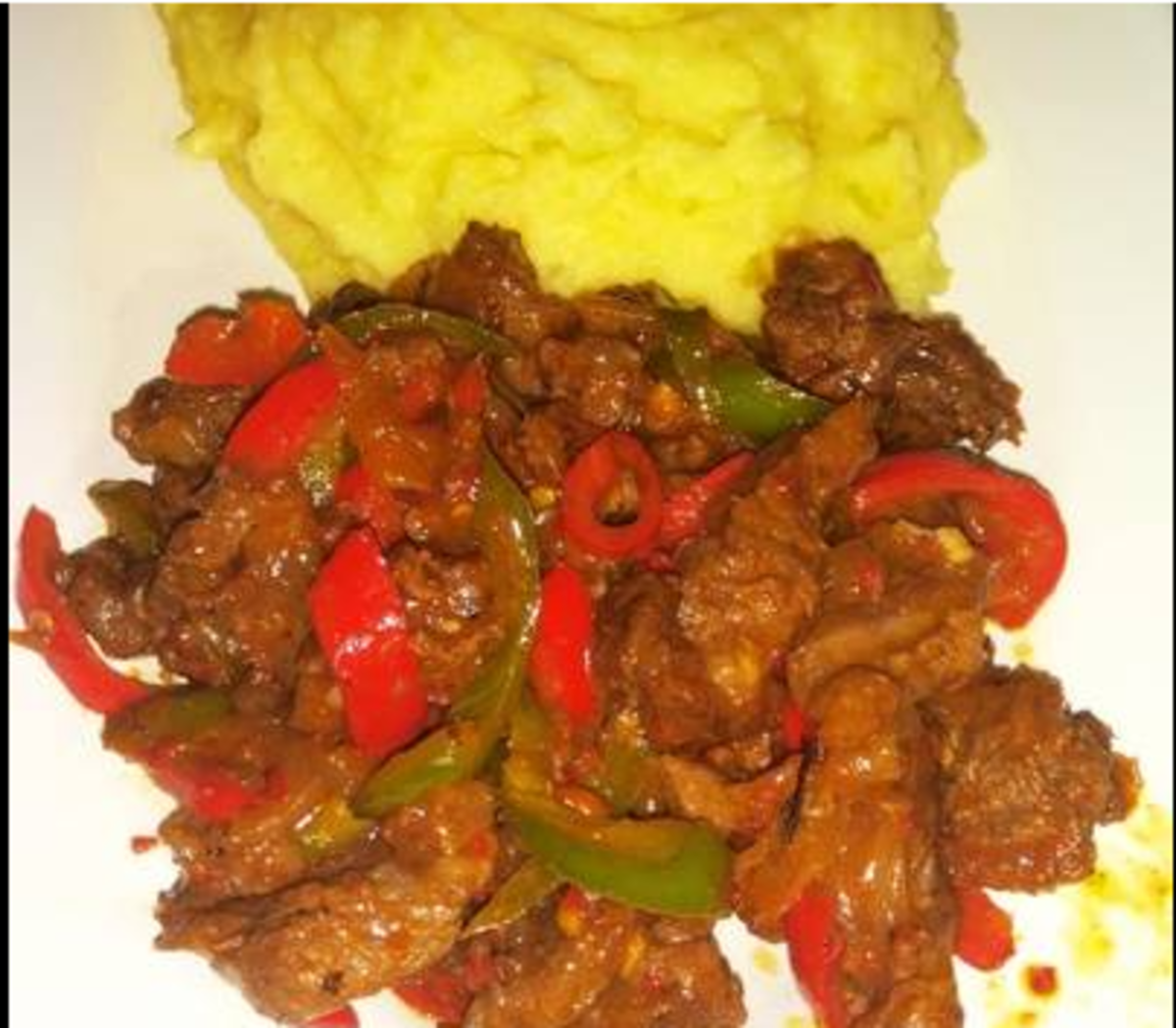 Wukunu and strifried goat meat