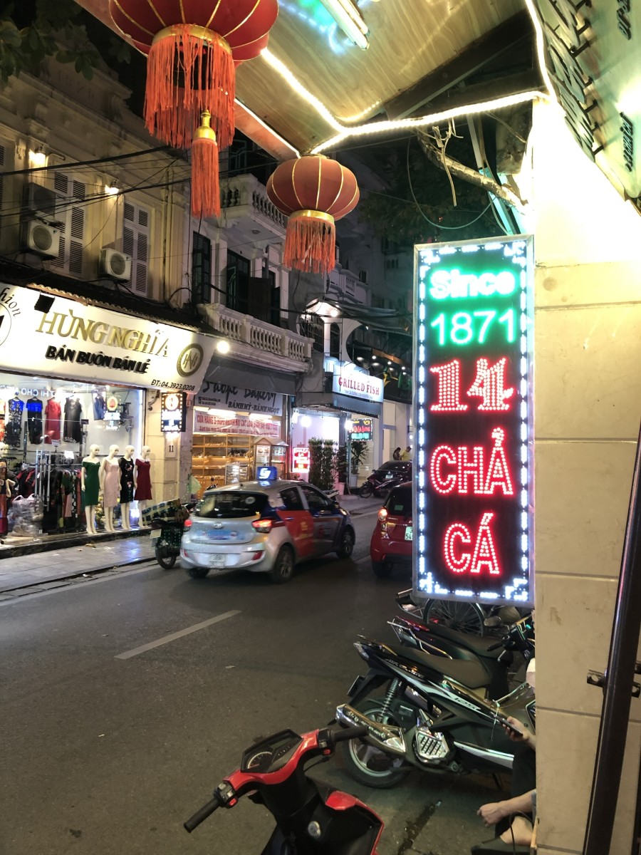 View of Colorful Decorations at a Market in Vietnam · Free Stock Photo, image size:900x1200