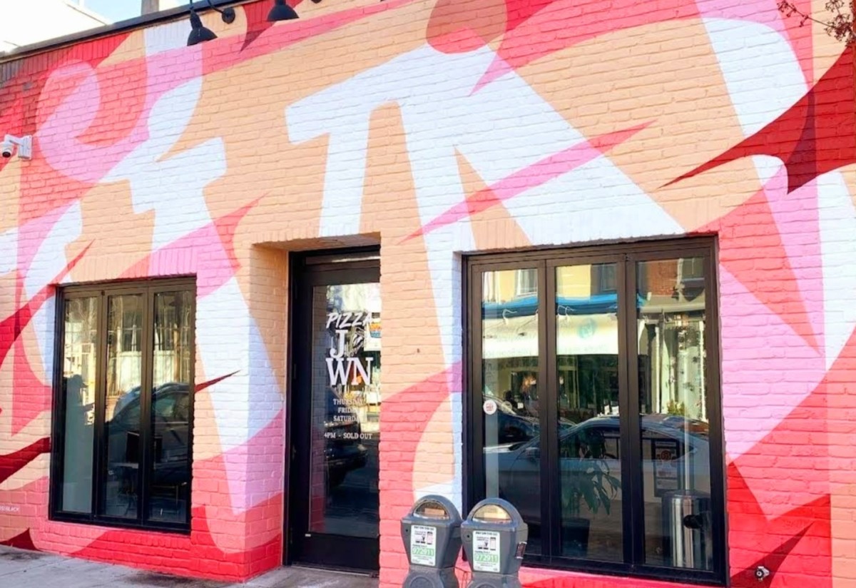 Pizza Jawn's bright, funky, and ever-changing storefront is hard to miss on Main Street in Manayunk.