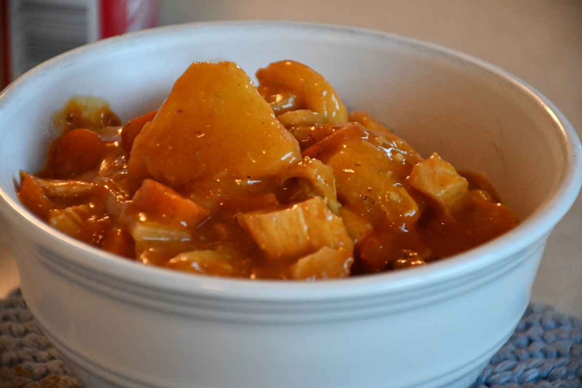 A bowl of homemade tropical curry. It has pineapple, mango, and banana in it. The recipe is inspired by a meal in the video game "Stardew Valley."