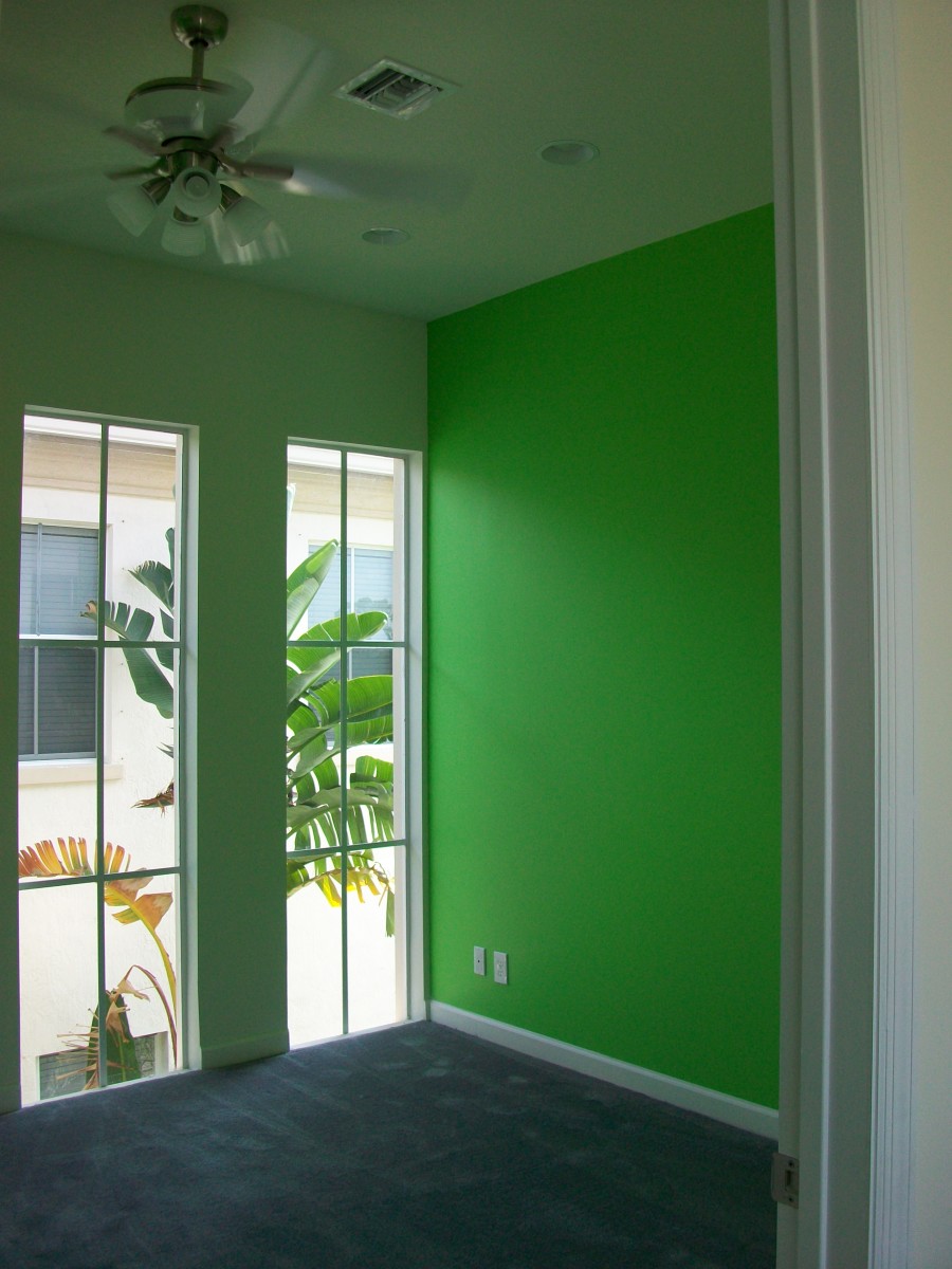 This homeowner used a bright, happy green for the walls of her children's playroom.