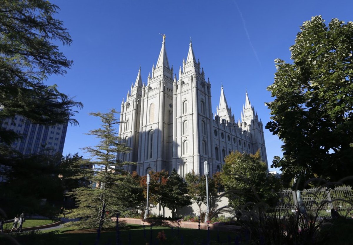 In this Oct. 5, 2019, file photo, The Salt Lake Temple stands at Temple Square in Salt Lake City. The Church of Jesus Christ of Latter-day Saints added new language to the faith's handbook Friday, Dec. 18, 2020, imploring members to root out prejudic