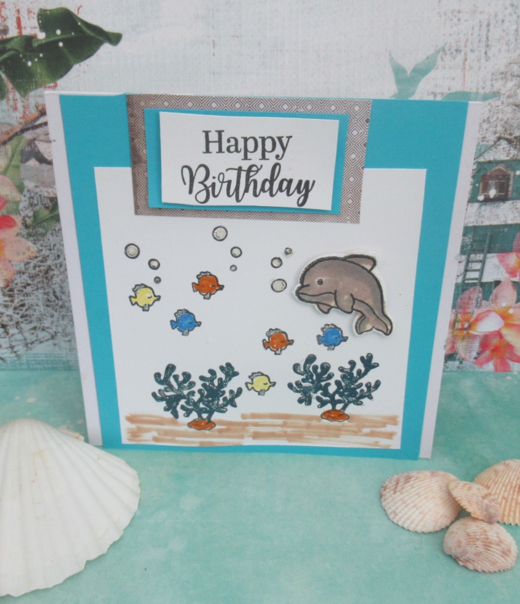 Yes, you can use stamping, die cutting and coloring on one card.