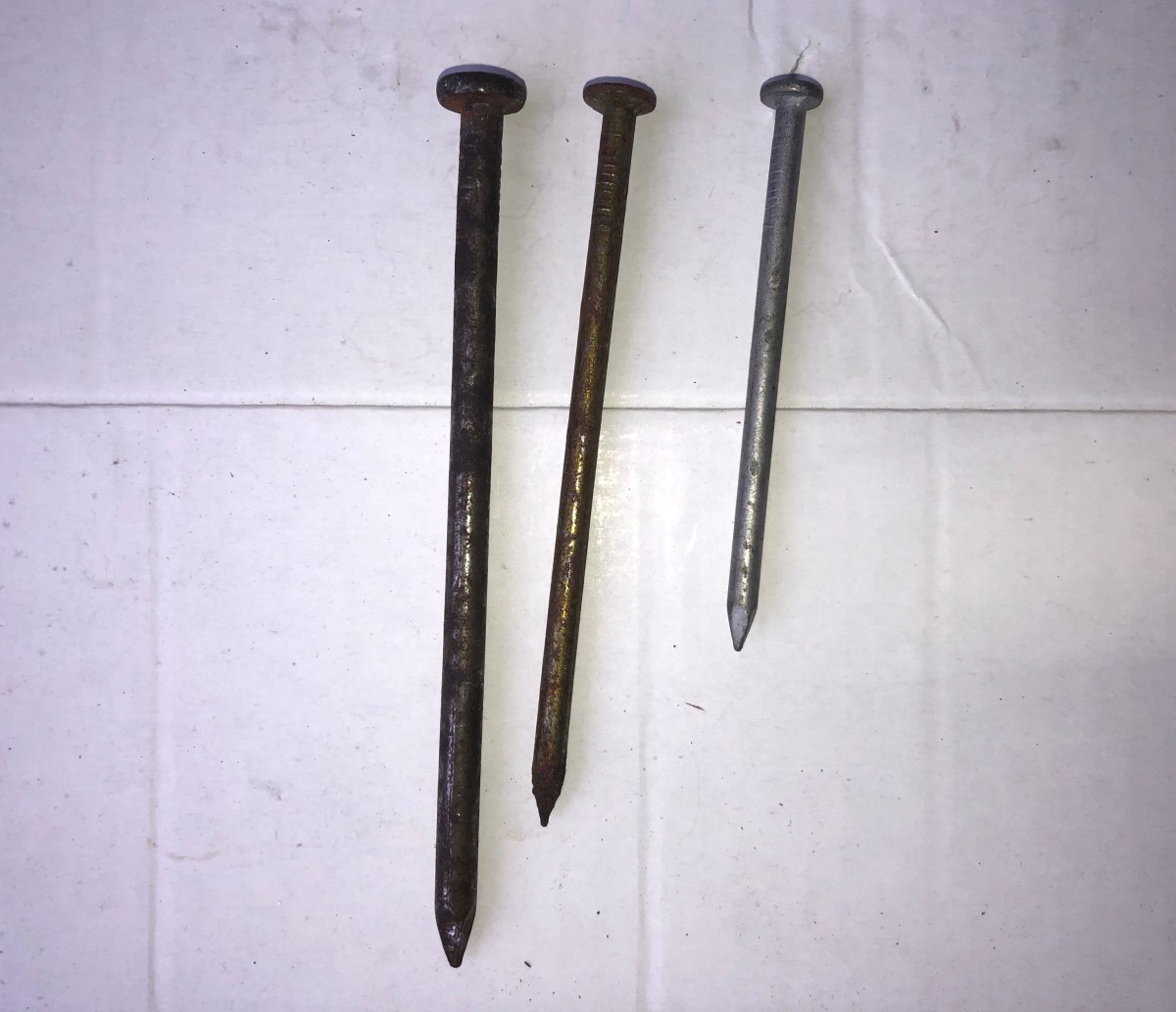 Three different common nails.