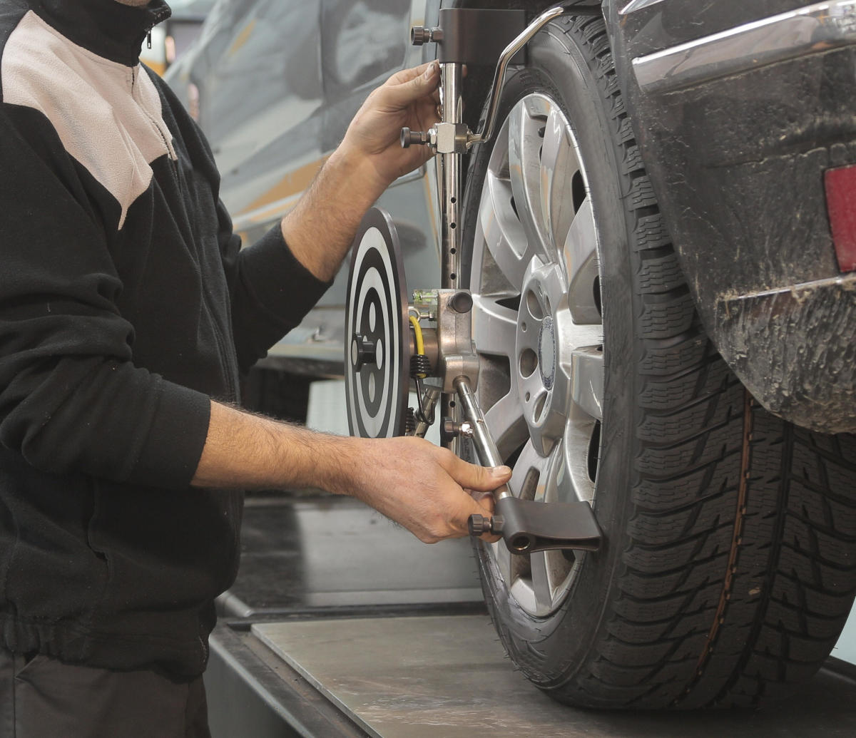 Your local tire shop can check wheel runout.