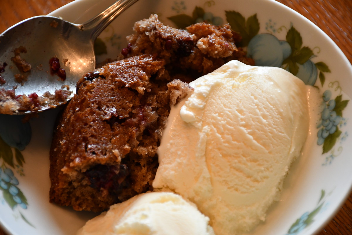 Homemade blackberry cobbler with a side of vanilla ice cream. This recipe is EASY to make and delicious.
