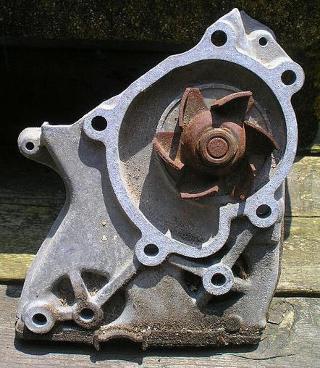 A water pump with a rusted impeller may cause irregular coolant flow.