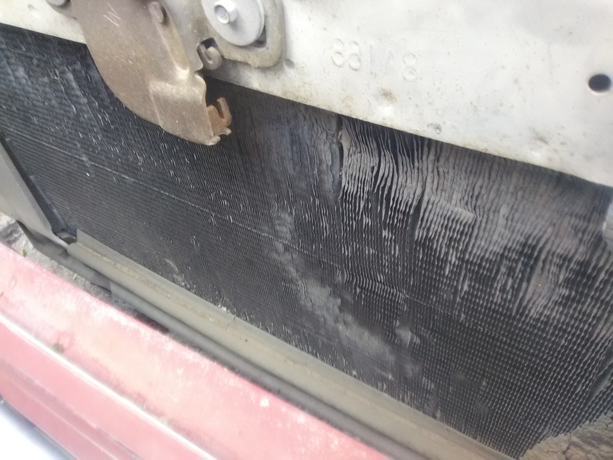 Remove debris from the radiator block.