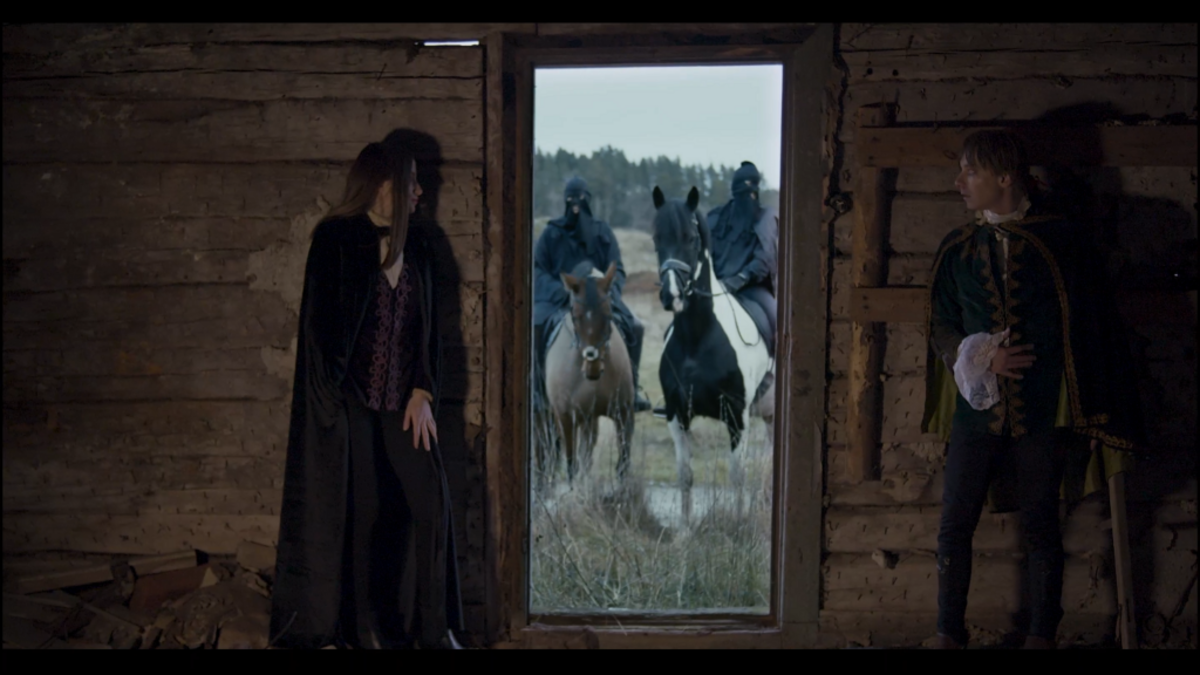Hope (Anna Osadcha) & White Moon Drake (Jayce Landberg) are hiding in a barn in Never Love Again