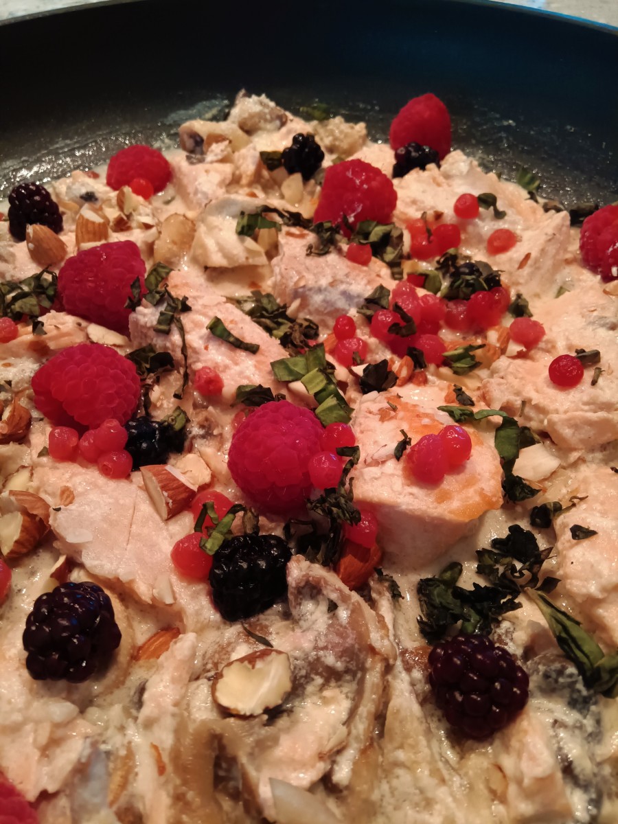Succulent salmon simmered in a cream sauce, wild mushrooms, and fresh berries