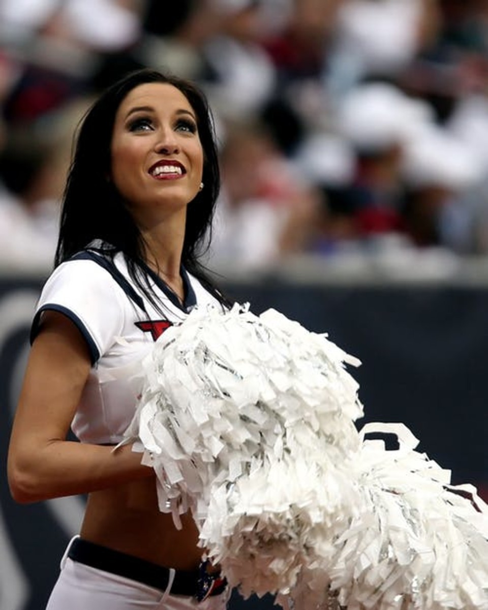 The cheerleader must keep smiling in good or bad football games.
