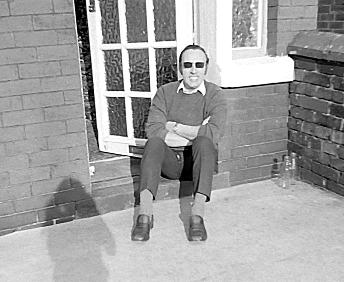 Dad in the 1970s, soaking up the sun on our front doorstep after work one summers evening.